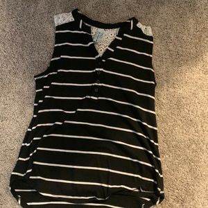 Black and white striped tank top with lace back. Size medium in woman’s